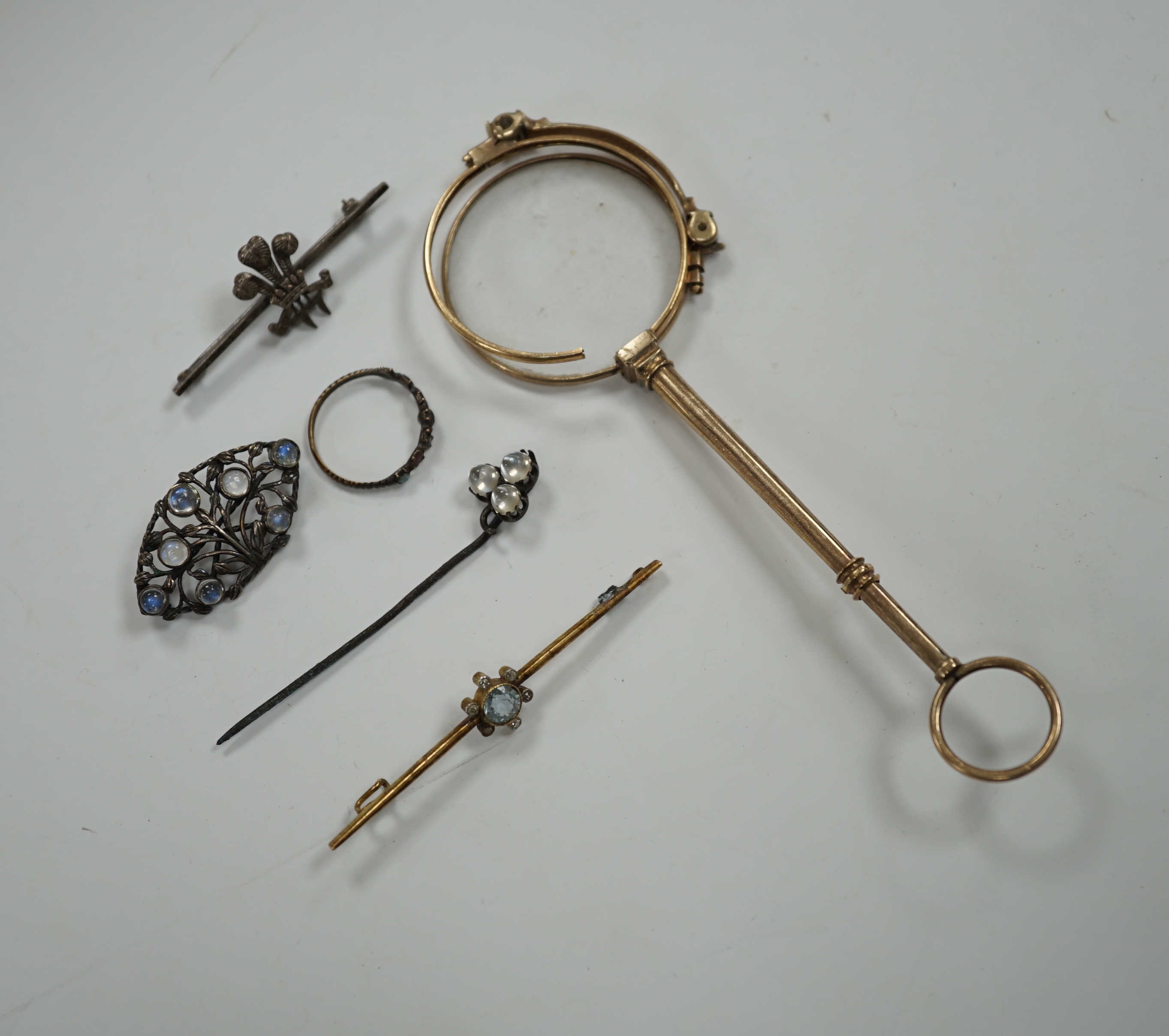 A pair of gold plated lorgnettes (a.f.) and five other items of jewellery including moonstone set (all a.f.).